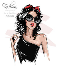 Hand drawn beautiful young woman in sunglasses. Stylish girl with bow on her head. Fashion woman look. Sketch. Vector illustration. - obrazy, fototapety, plakaty