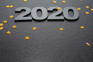 Happy New Year 2020. Symbol from number 2020 on stone background