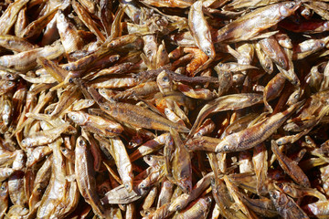 Top view of small dried fish at the market