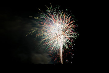 Fototapeta premium Colorful Fireworks Exploding in the Dark Night Sky 82