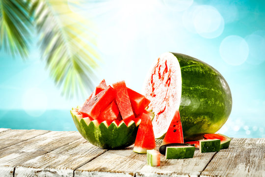 Watermelon on desk and free space for your decoration. 