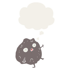 cartoon rock falling and thought bubble in retro style