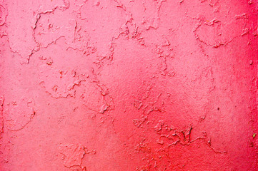Texture of iron metal painted bright paint peeling paint old battered scratched cracked ancient rusty metal sheet wall with corrosion. The background
