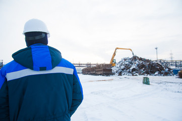 Crane-loading scrap in a train