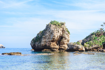 Fototapeta na wymiar View of Isola Bella beach in Taormina, Sicily, Italy