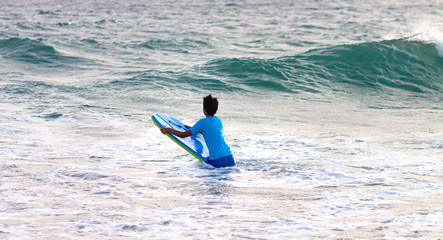 SURF IN THE WAVES OF THE BEACHES OF CADIZ IN SPAIN