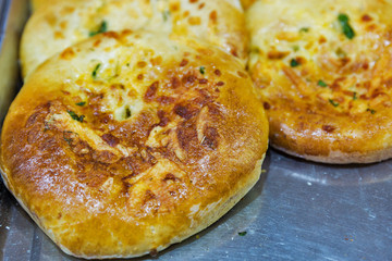 Khachapuri closeup with the cheese