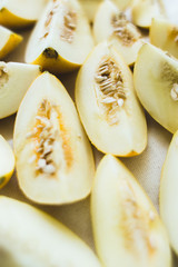 A group of brightly lit melon slices.
