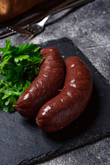 Homemade uncooked black pudding sausages