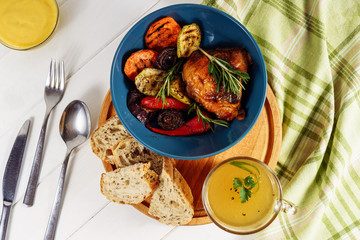 Grill Vegetables Chicken Bread and Mustard Sauce Flat Lay. Delicious Dish Cooked Barbeque Bird Meat, Zucchini and Paprika in Bowl on Wooden Board, Spoon, Fork and Knife Isolated on White Background