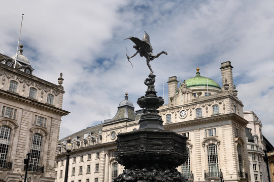 Shaftesbury Memorial Fountain toped by statue of winged Anteros in Piccadilly Circus with The Quadrant on Regent street London England