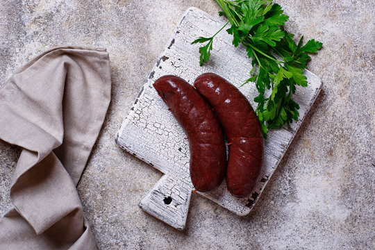 Homemade uncooked black pudding sausages