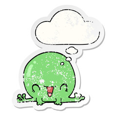 cartoon frog and thought bubble as a distressed worn sticker