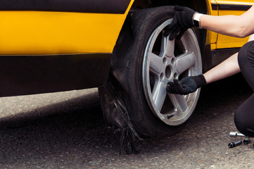 worn wheel after drift. replacement of a spoiled wheel. bald tire