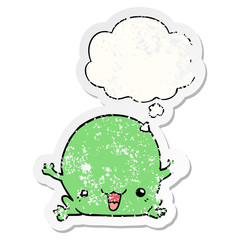 cartoon frog and thought bubble as a distressed worn sticker