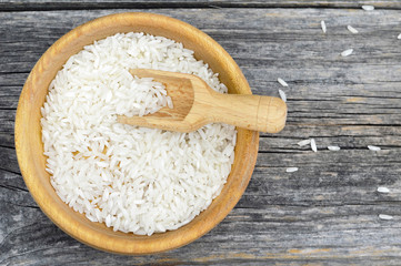 Top view of rice in wooden bowl