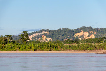 Sunset at Beni river cliffs, adventure in jungles of Madidi national park, Amazon river basin in Bolivia, South America