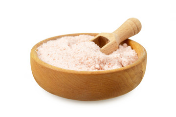 Pink Himalayan salt in wooden bowl isolated on white background