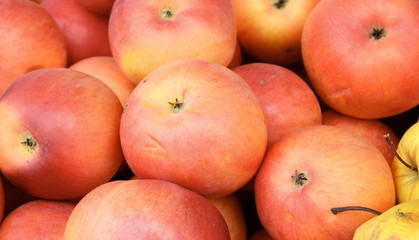 Apples on the market. Fresh organic red apples from the local farmers market. Apples background background texture seasoning Apples for sale. 