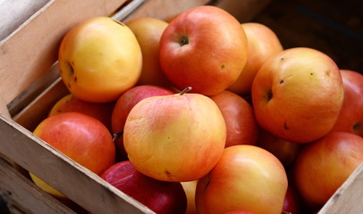 Apples on the market. Fresh organic red apples from the local farmers market. Apples background background texture seasoning Apples for sale. 