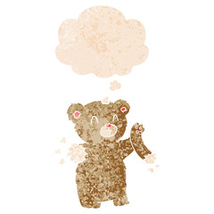cartoon teddy bear with torn arm and thought bubble in retro textured style