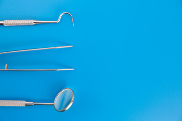 Professional stomatology tools on light background, dental health care. Dental hygiene and health concept