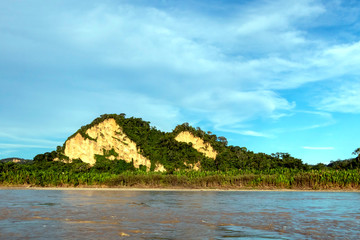 Sunset at Beni river cliffs, adventure in jungles of Madidi national park, Amazon river basin in Bolivia, South America