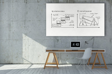 Modern minimalist workstation with business doodles sketched on a whiteboard above a small neat desk with laptop and chair 