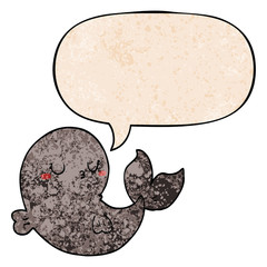 cute cartoon whale and speech bubble in retro texture style