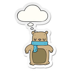 cartoon bear with scarf and thought bubble as a printed sticker