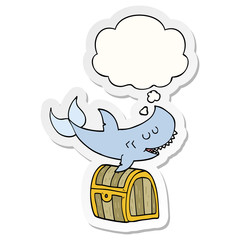 cartoon shark swimming over treasure chest and thought bubble as a printed sticker