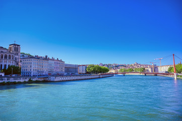 Fototapeta na wymiar A view of Lyon, France along the Saone river in the afternoon.