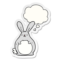 cartoon rabbit and thought bubble as a printed sticker