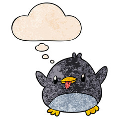 cute cartoon penguin and thought bubble in grunge texture pattern style