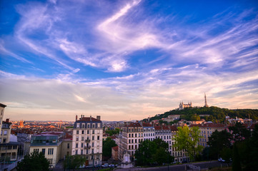 Obraz premium Lyon, France and the Basilica of Notre-Dame de Fourviere from Jardin des plantes.