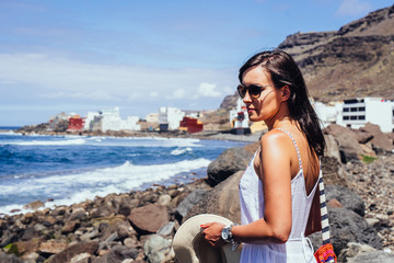 Fototapeta na wymiar Young woman enjoying her time off on hot summer holidays, Gran Canaria, Spain. 