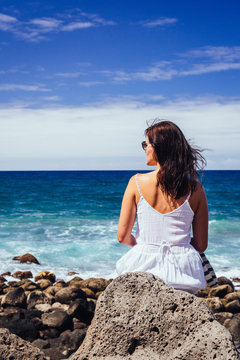 Young woman enjoying her time off on hot summer holidays, Gran Canaria, Spain. 