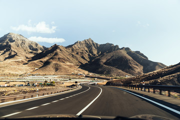 Nature and landscape of the Gran Canaria. Rocky mountains range, valleys, ocean.