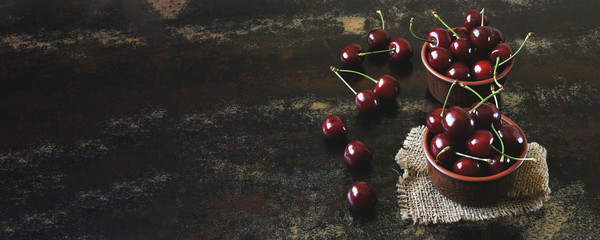 Fresh large sweet cherries. Sweet cherries in bowls. Vitamin concept. © Oksana