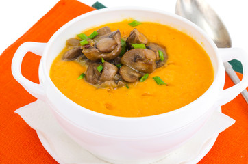 Dishes with mushrooms in plates on table