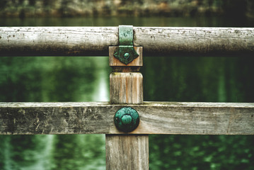 wooden handrail of an ancient japanese bridge