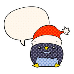 cute cartoon penguin wearing christmas hat and speech bubble in comic book style