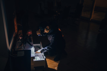 Man doing housebreaking in apartment