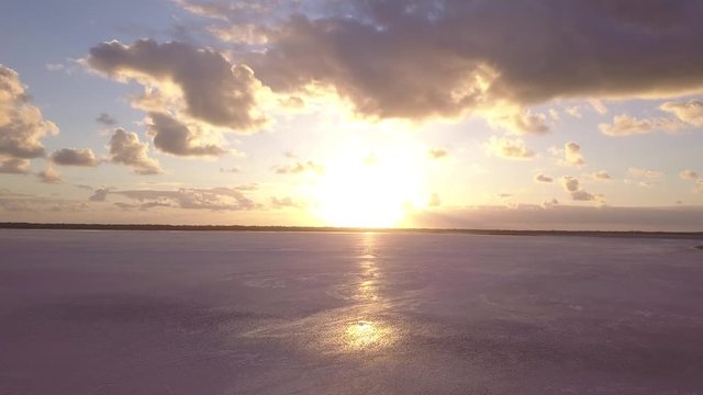 Aerial view of the Pink Lake in south west Australia. The pink lake reflects the red Australian desert sun in its clear water