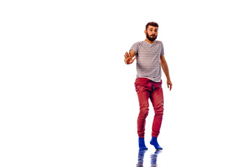 Cute guy doing breakdance isolated on white