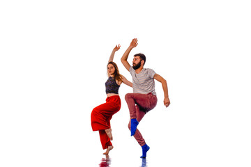 Talented hip-hop dancers excercising together isolated on white