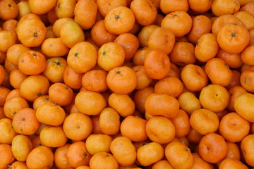 Fresh mandarin oranges texture and background.