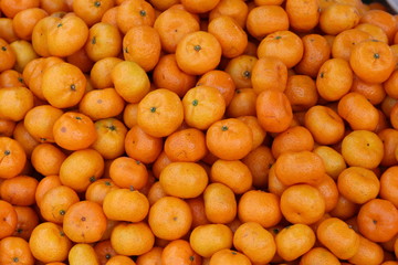 Fresh mandarin oranges texture and background.