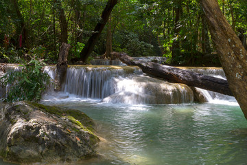 Fototapeta premium Erawan Waterfall and sunlight in forest