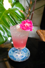Lychee fruit refreshment in high Glass with straw tube with ice and topping decoration for customer, Fresh smoothies Juice natural to make diet good health for Lunch table bar window seat